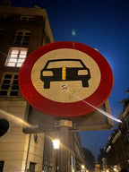 two-handed handstand sumo b-boy sticker on a traffic sign in Amsterdam